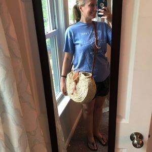Round straw purse with faux leather strap